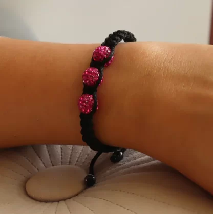 Pulsera de hilo 3 ésferas rosa oscuro