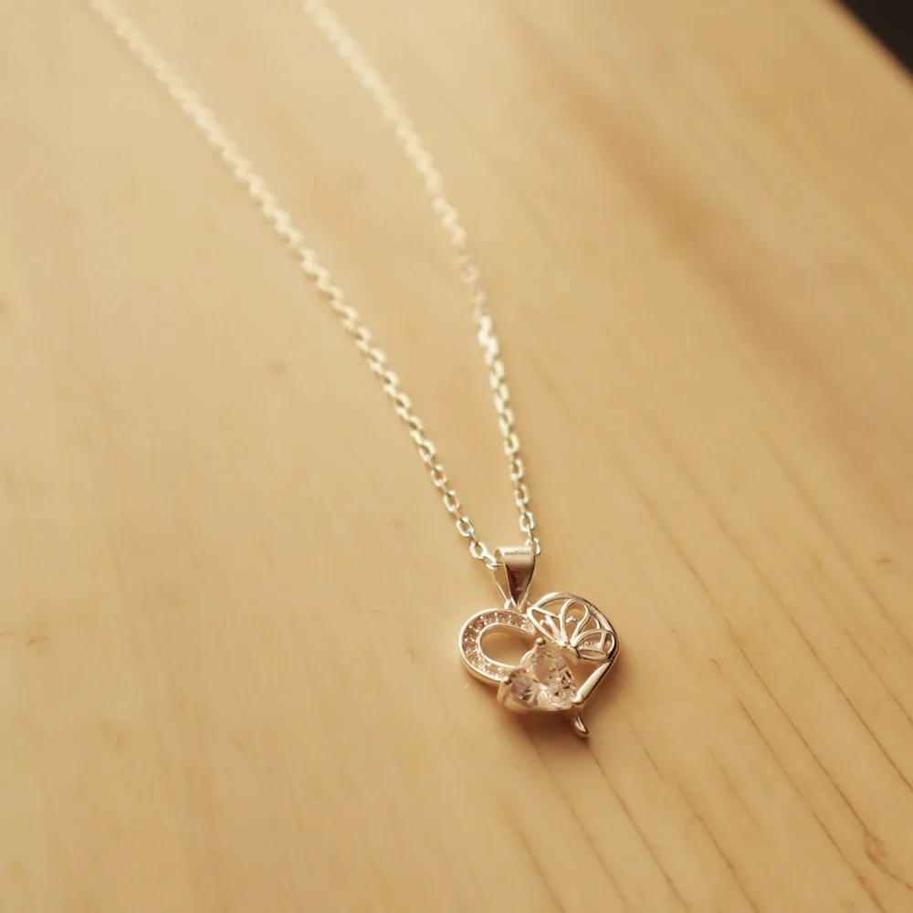 Collar doble corazón circón